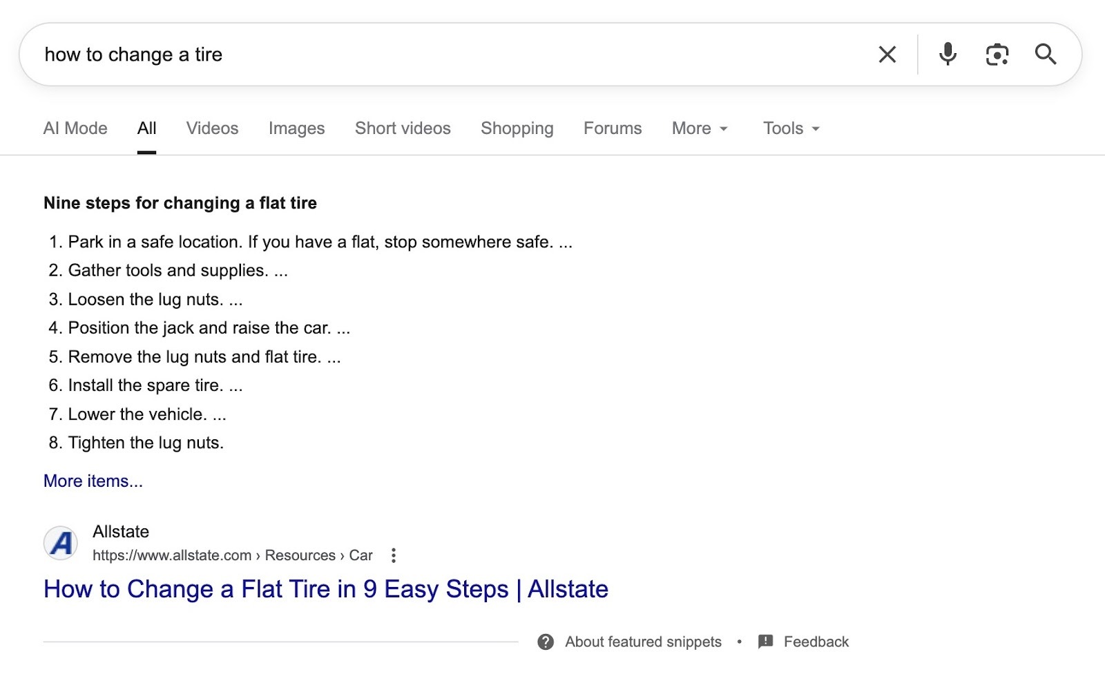 SERP for the term "how to change a tire" yielding a featured snippet which directly answers the user's question.